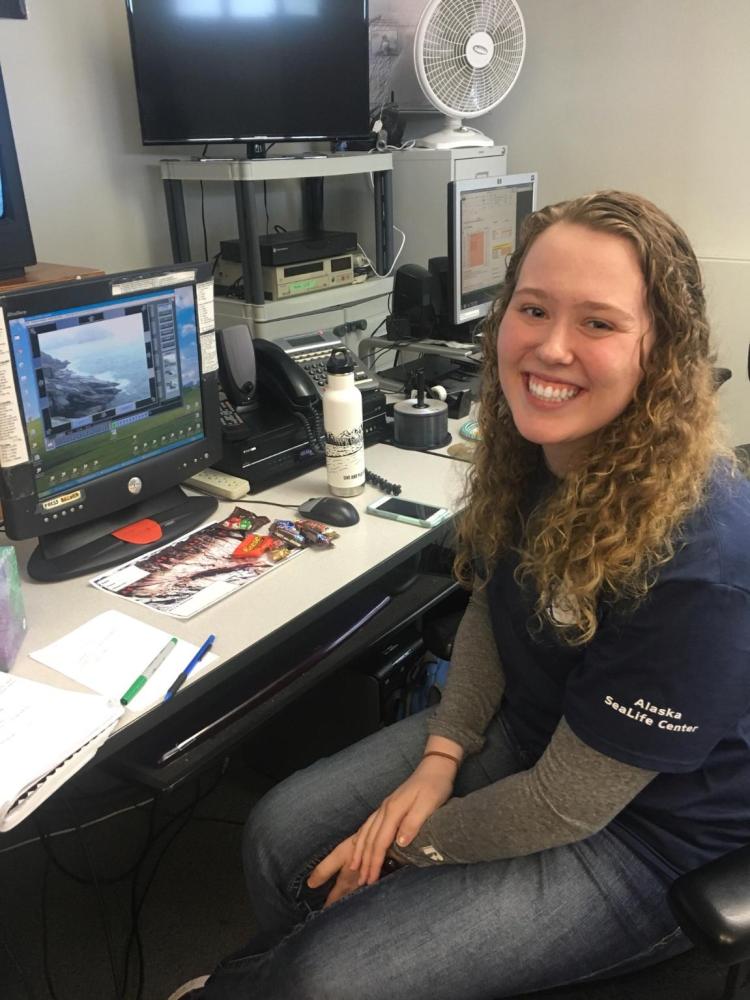 photo of fellow Kathryn Appler sitting at a desk